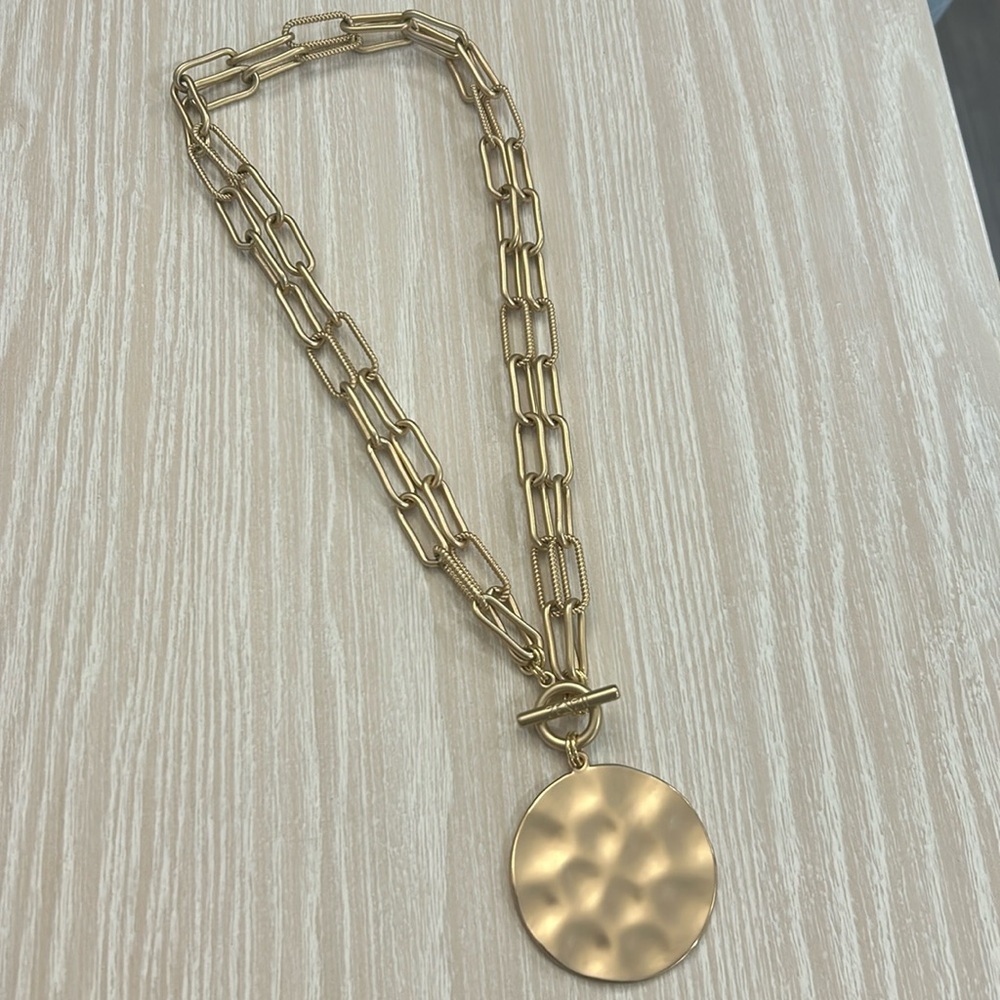 Gold adjustable chain necklace with large gold pendant